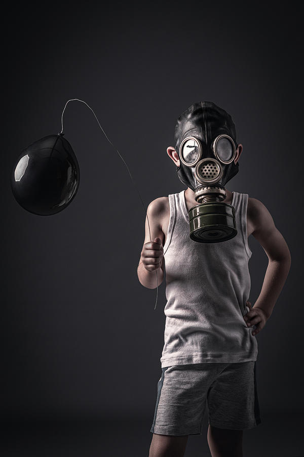 Child With Gas Mask And Black Balloon Photograph By Gualtiero Boffi