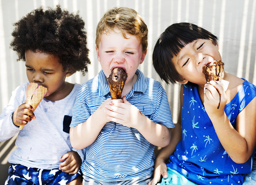 Children enjoying with ice cream Photograph by Rawpixel