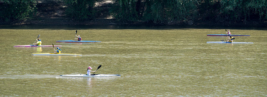 Children kayaking on the river Tisa Photograph by Slavica