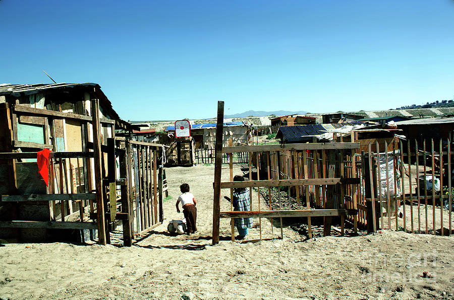 Children Play Amoongst The Shacks And Homes, In The Hills Of Tij Photograph