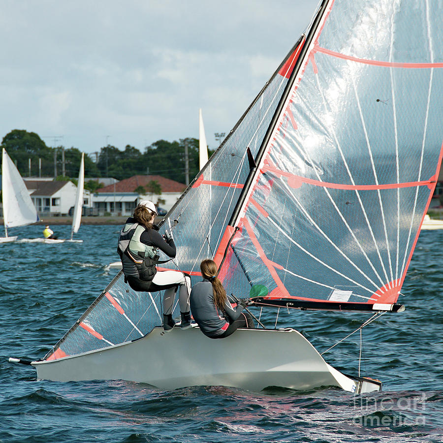 Children Sailing Small Boats And Dinghies On Salt Water. Photograph