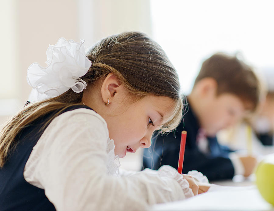 Children writing drawing in class Photograph by Tatiana Kolesnikova