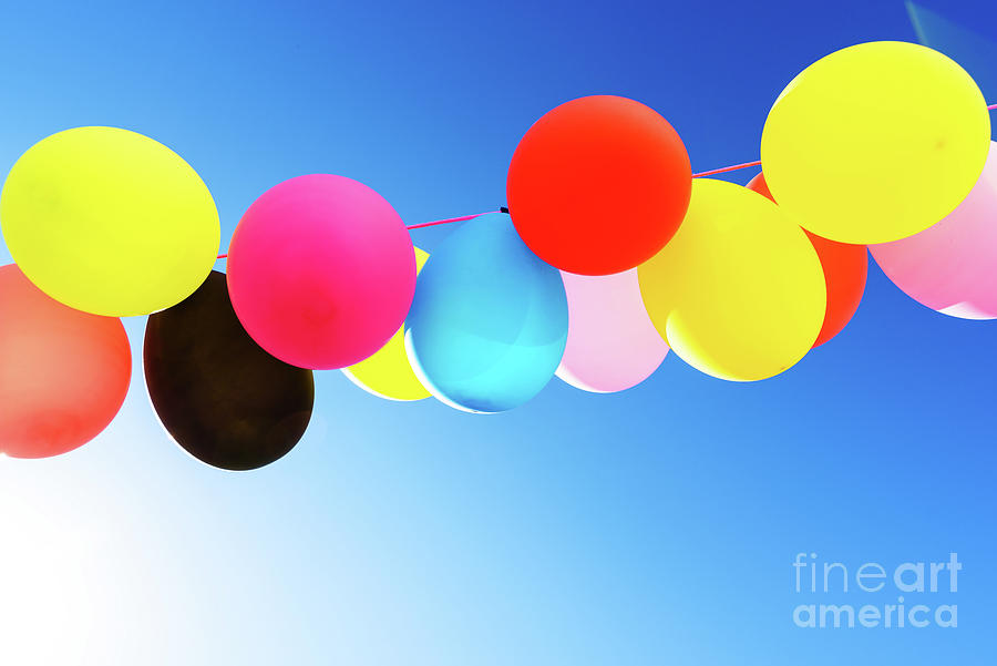 Childrens Colored Balloons Hanging On A Rope Outdoors On A Summ Photograph