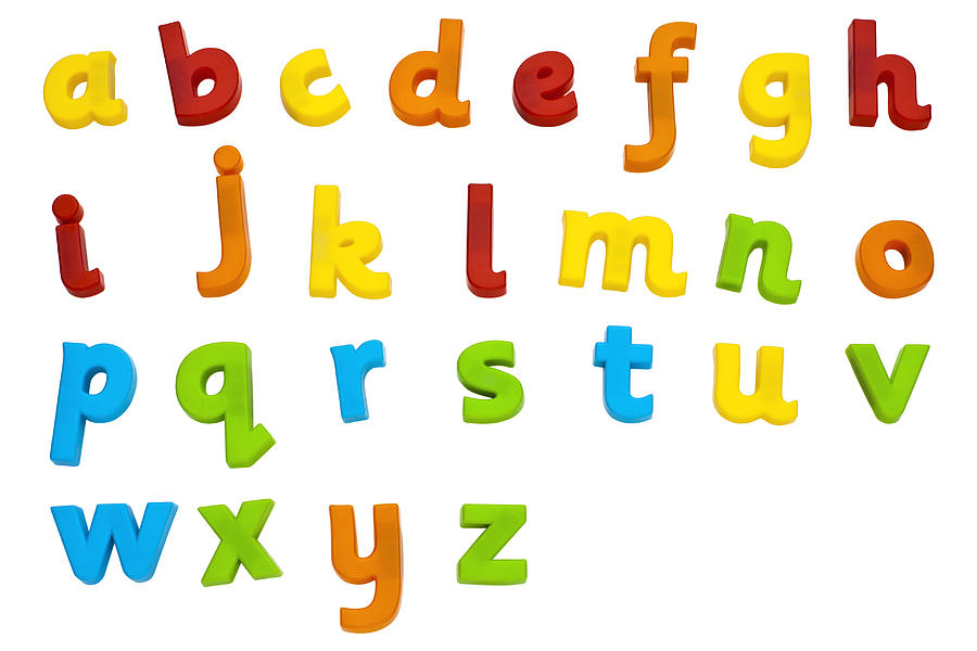 Childrens plastic magnetic alphabet letters Photograph by Creative Crop