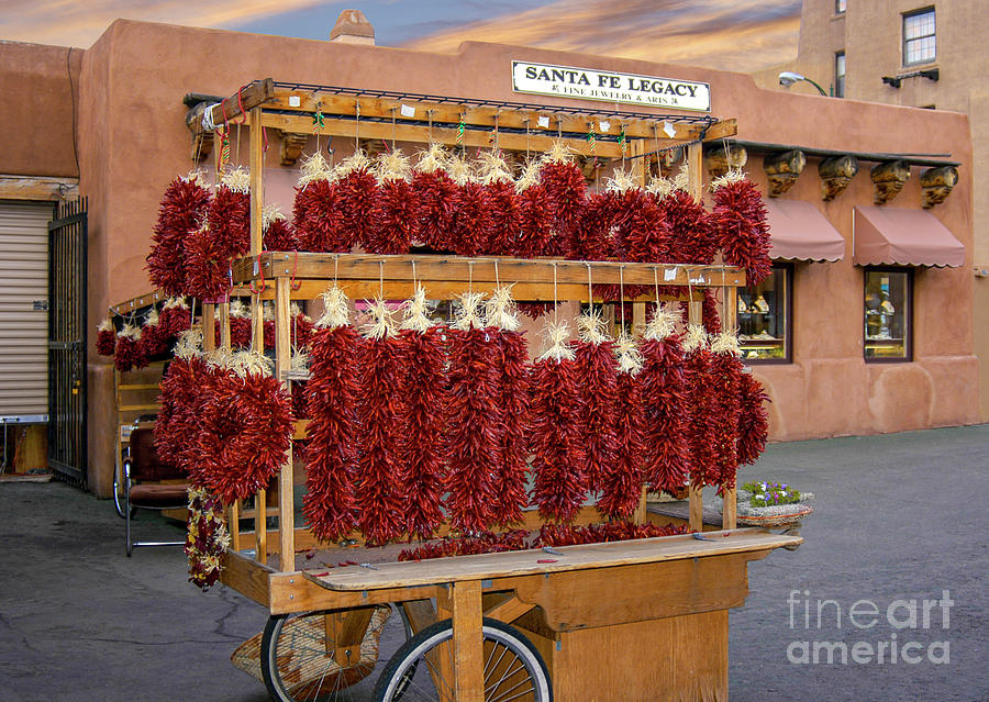 Chile Ristras hanging out for Tourist to Buy. Photograph by Gunther Allen