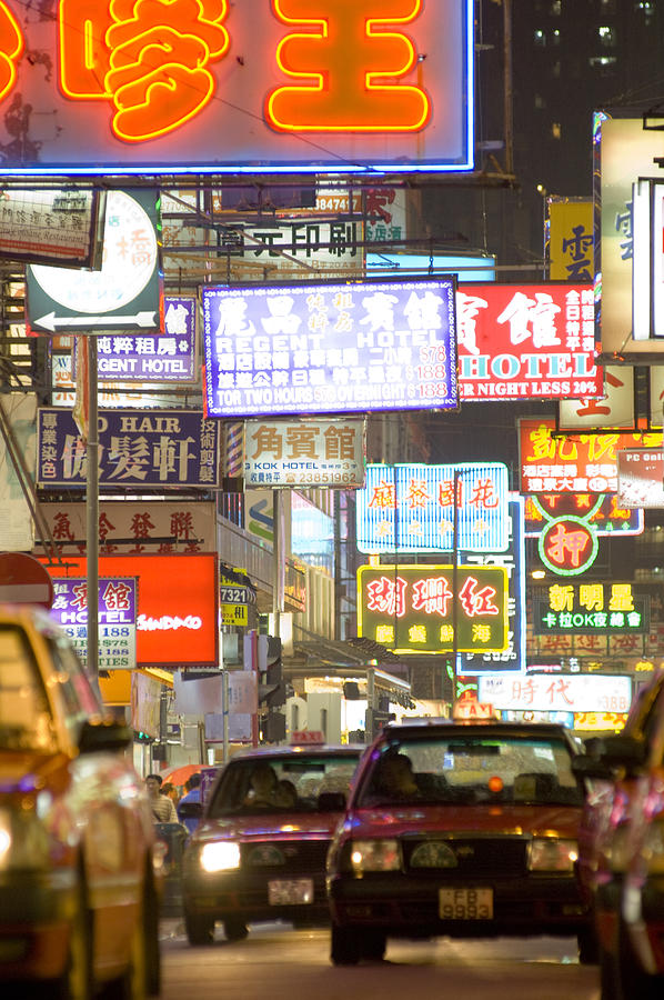 China, Hong Kong, traffic on downtown street at night Photograph by Maremagnum