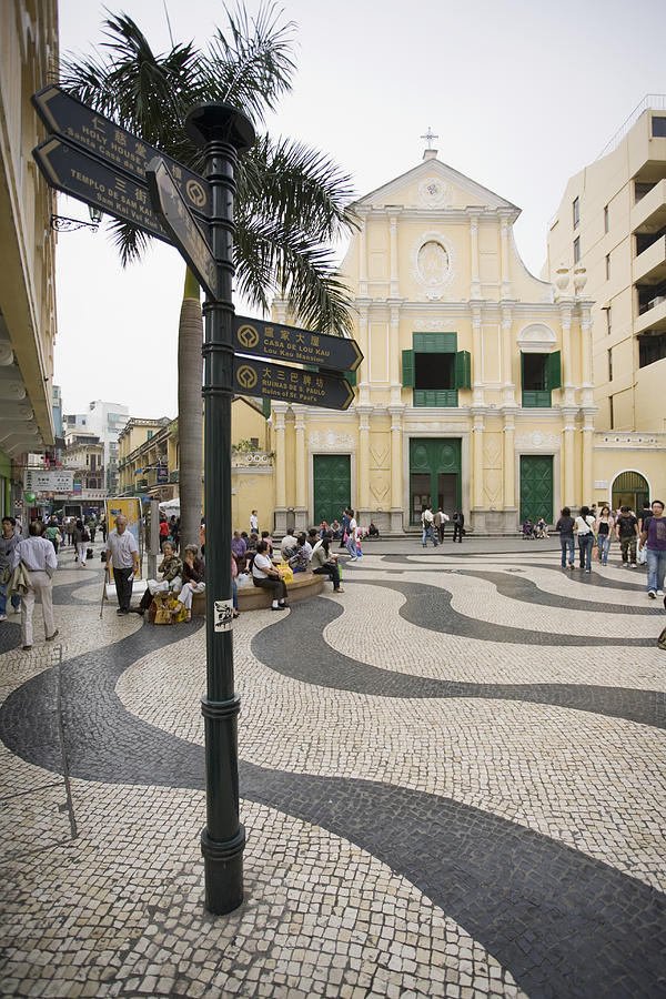 China, Macau Special Administrative Region, Street sign and waved pavement in front of St Dominics Church Photograph by Jerry Driendl