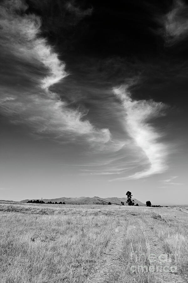 Chinchero Plateau skyscape in black and white Peru Photograph by James Brunker