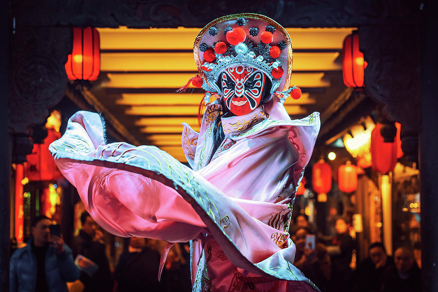 Chinese actress performs a traditional face-changing sichuan opera show Photograph by Philippe Lejeanvre