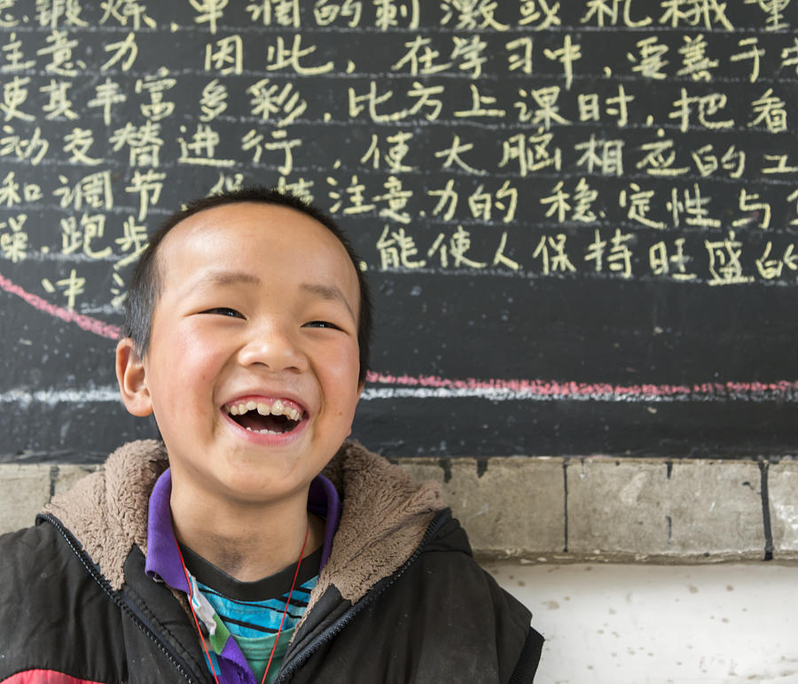 Chinese School boy, looking at camera, cheerful Photograph by Pidjoe