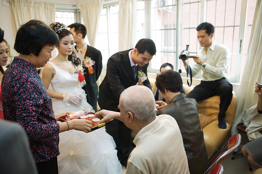 Chinese wedding tea ceremony Photograph by PhotoAlto/James Hardy