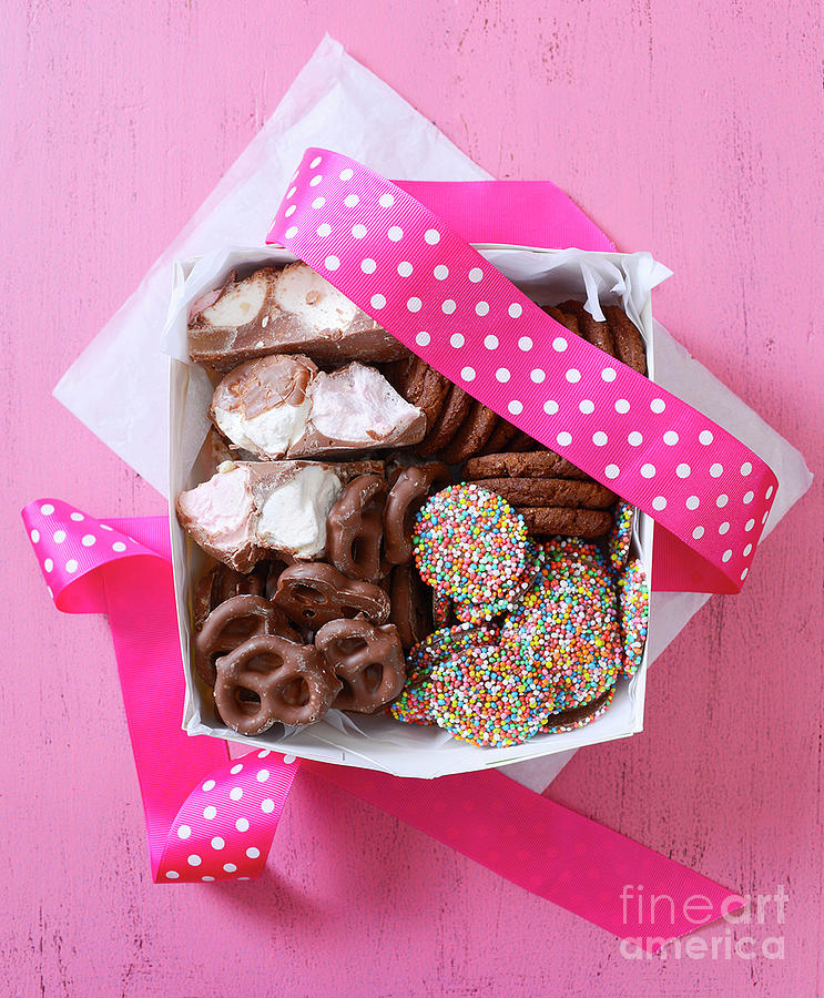 Chocolate candy and cookies gift box.  Photograph by Milleflore Images