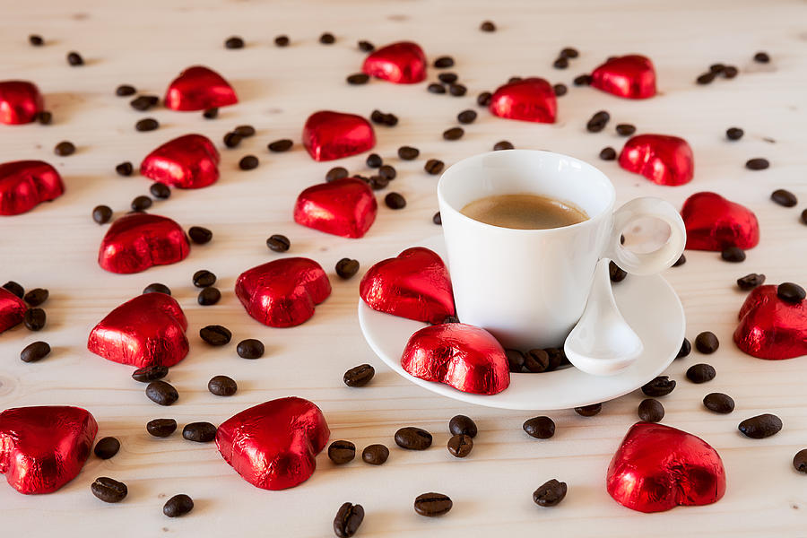 Chocolate hearts and coffee beans on a table Photograph by LuigiMorbidelli