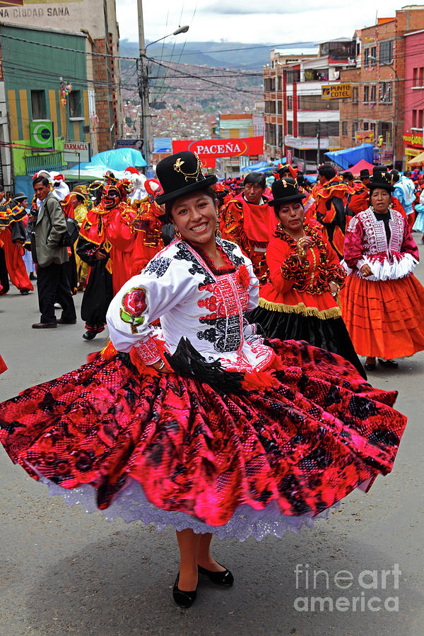 Portrait Photograph - Cholita dancing at Carnival parades La Paz Bolivia by James Brunker