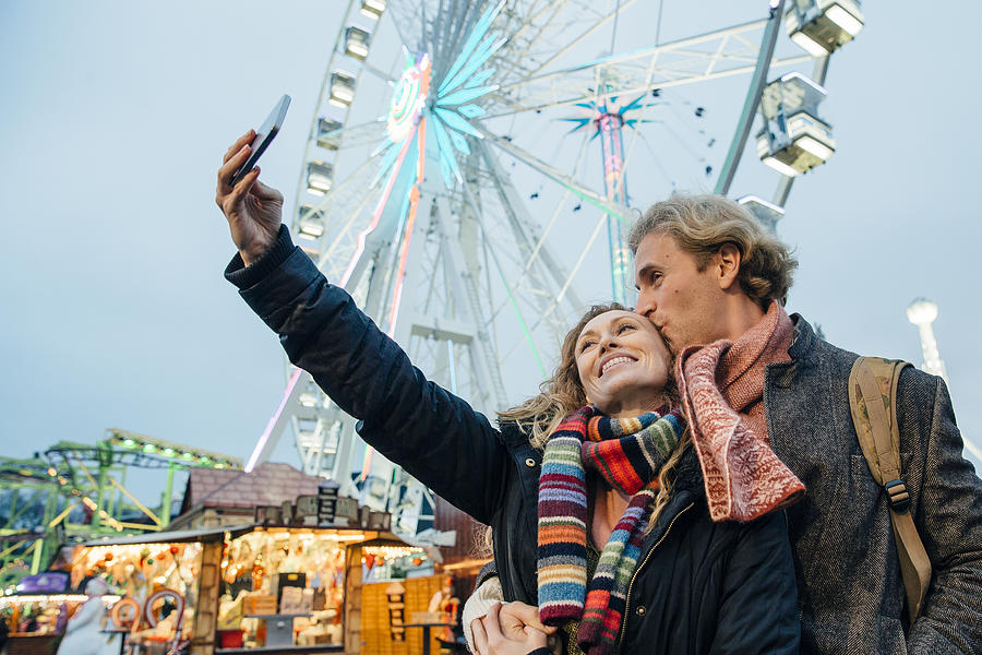 Christmas Amusement Park Selfie Photograph by SolStock