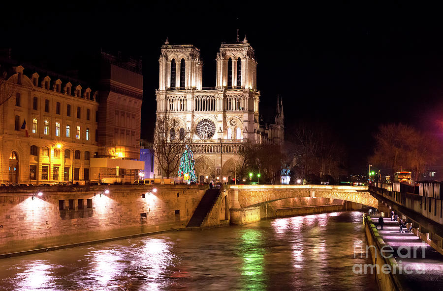 Christmas at Notre Dame de Paris in France Photograph by John Rizzuto