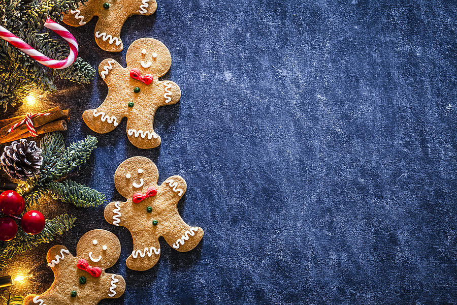 Christmas backgrounds: homemade gingerbread cookies border with copy space. Photograph by Fcafotodigital