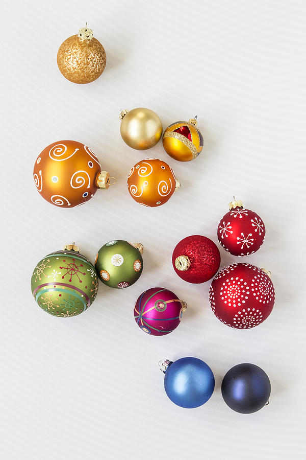 Christmas baubles on white background Photograph by Westend61