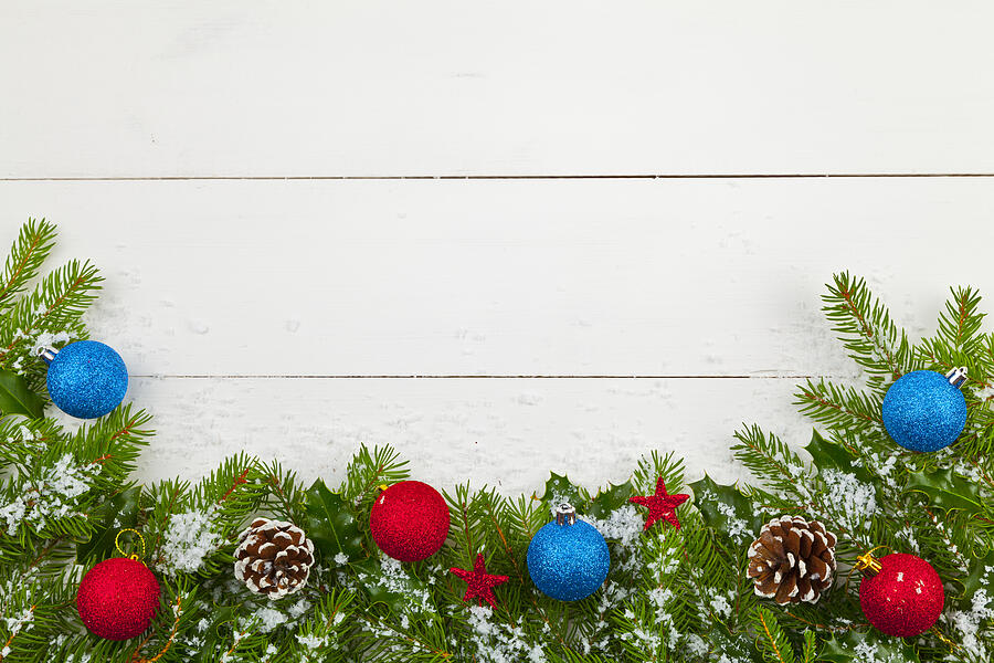 Christmas decoration on the wooden white background Photograph by Gkrphoto