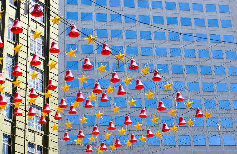 Christmas decorations with backdrop of buildings Photograph by Lyn Holly Coorg
