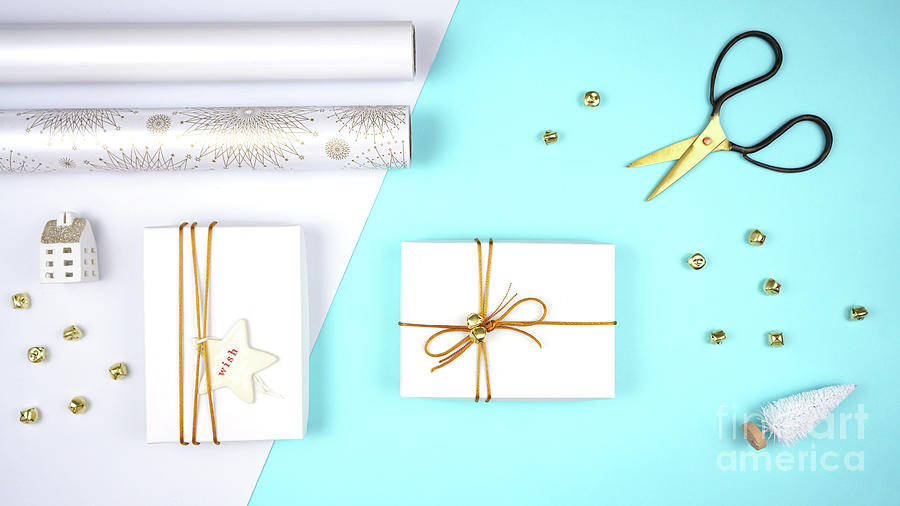 Christmas holiday flat lay gift wrapping on-trend composition. Photograph by Milleflore Images