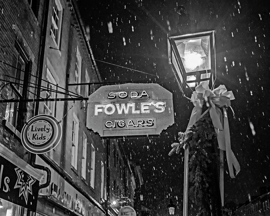 Christmas in Newburyport Massachusetts Soda Fowles Cigars Sign Snow Storm Black and White Photograph by Toby McGuire