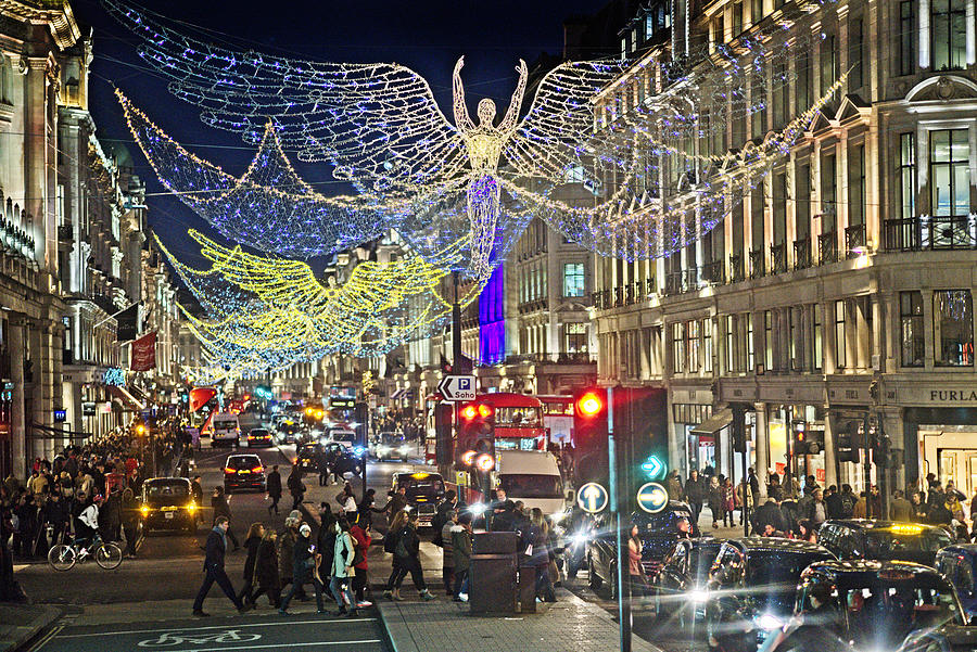 Christmas lights and crowds of shoppers. On Regents Street London. Photograph by Blue Sky In My Pocket