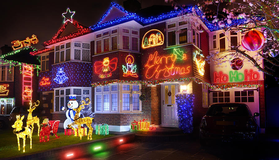 Christmas lights in the suburbs Photograph by Peter Dazeley