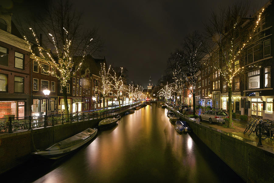 Christmas lights on an Amsterdam canal Photograph by Matthew Drinkall