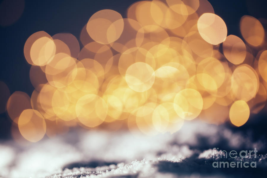 Christmas lights on snow, vintage background Photograph by Michal Bednarek