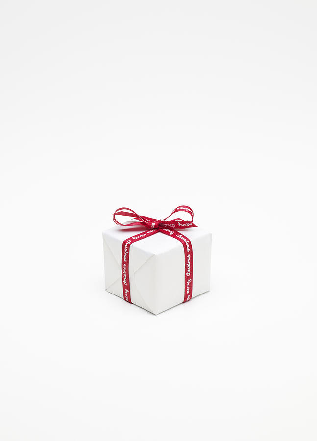 Christmas Present Wrapped Up In White Paper Photograph by Oppenheim Bernhard