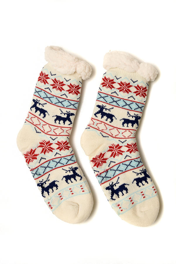 Christmas socks isolated on white background Photograph by YaroslavKryuchka