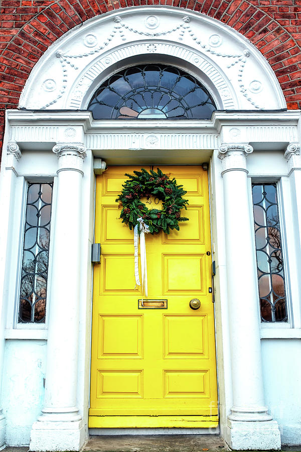 Christmas Yellow Door in Dublin Photograph by John Rizzuto