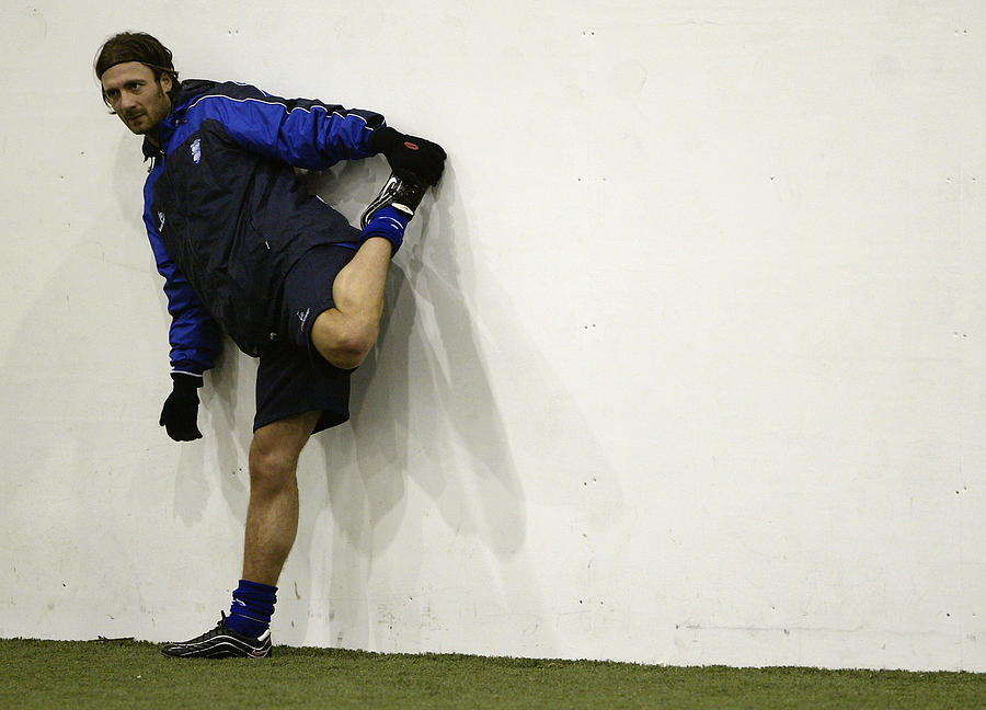 Christophe Dugarry of Birmingham City warms up before training Photograph by Bryn Lennon