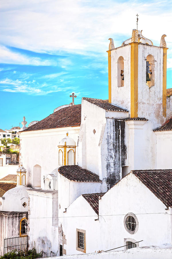Church and white facades in Tavira, Portugal Photograph by Stefano Orazzini