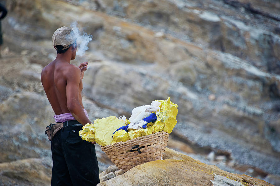 Cigarette break for a sulfur carrier, Ijen. Java. Indonesia Photograph by Lie Yim