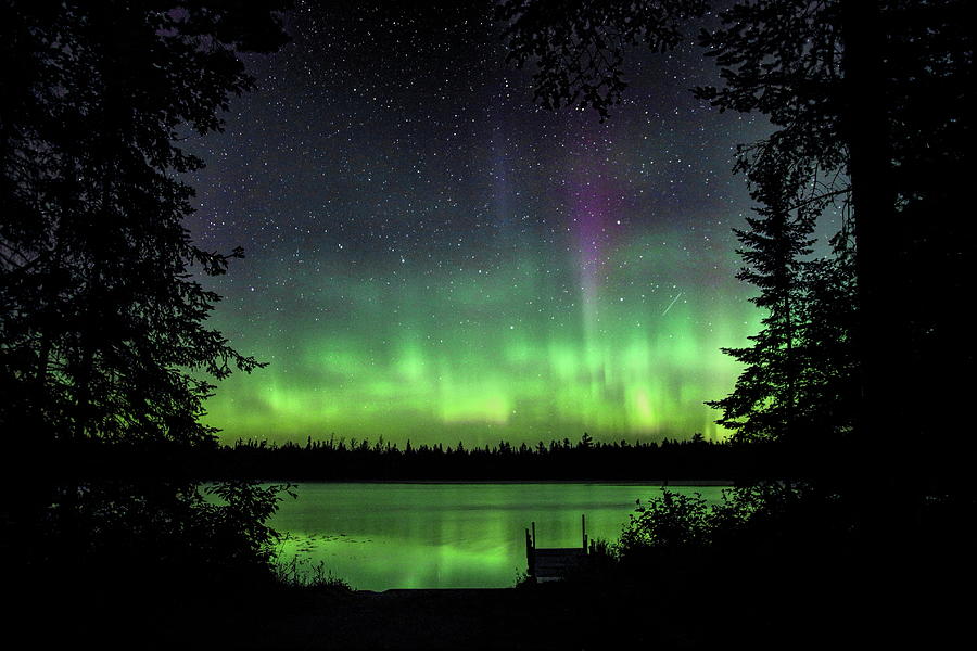 Circle Of Northern Lights Photograph by Dale Kauzlaric