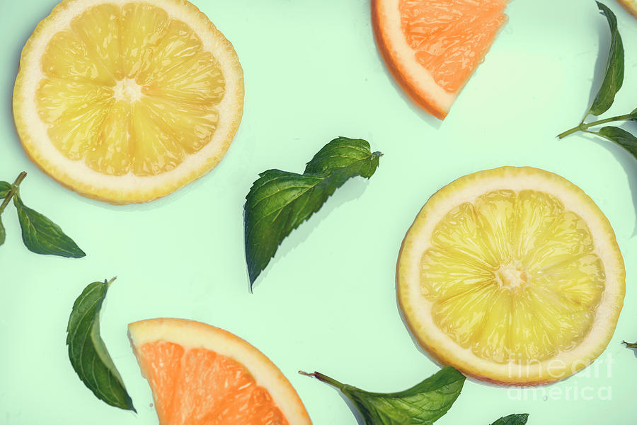Citrus pattern on retro mint background Photograph by Jelena Jovanovic