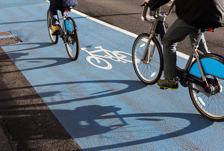 City Cyclists Photograph by Richard Newstead