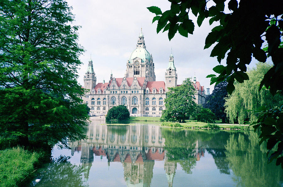 City Hall Reflected in a Pond in Hanover, Germany Photograph by Mel Curtis