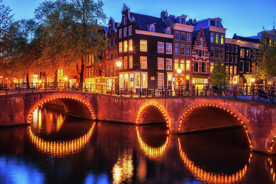 City Photograph - City of Amsterdam by Night by Artur Bogacki