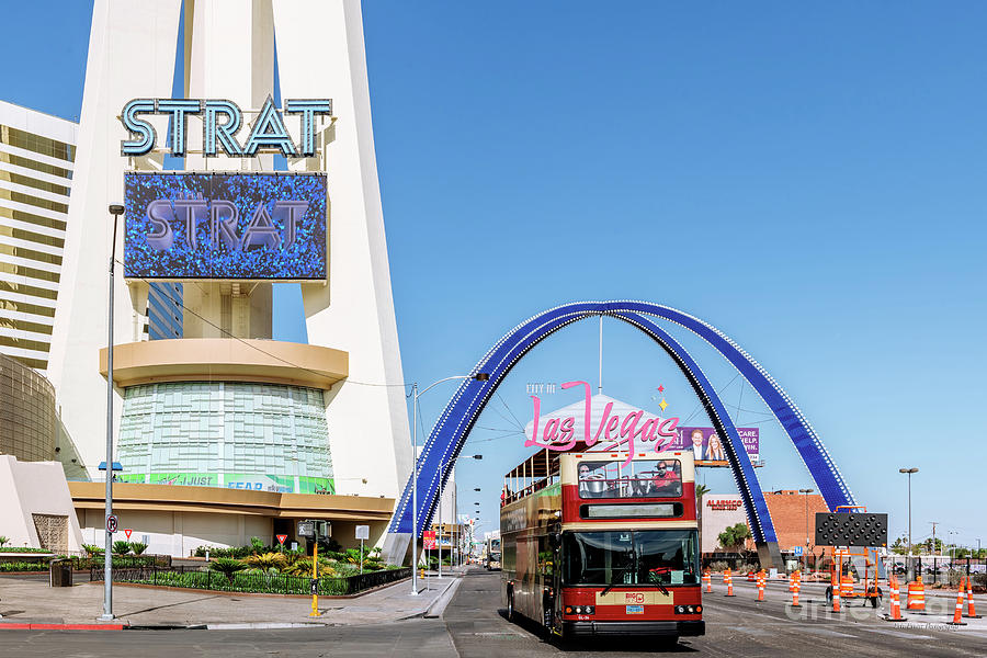 City of Las Vegas Arch and Strat Double Decker Tour Bus Photograph by Aloha Art