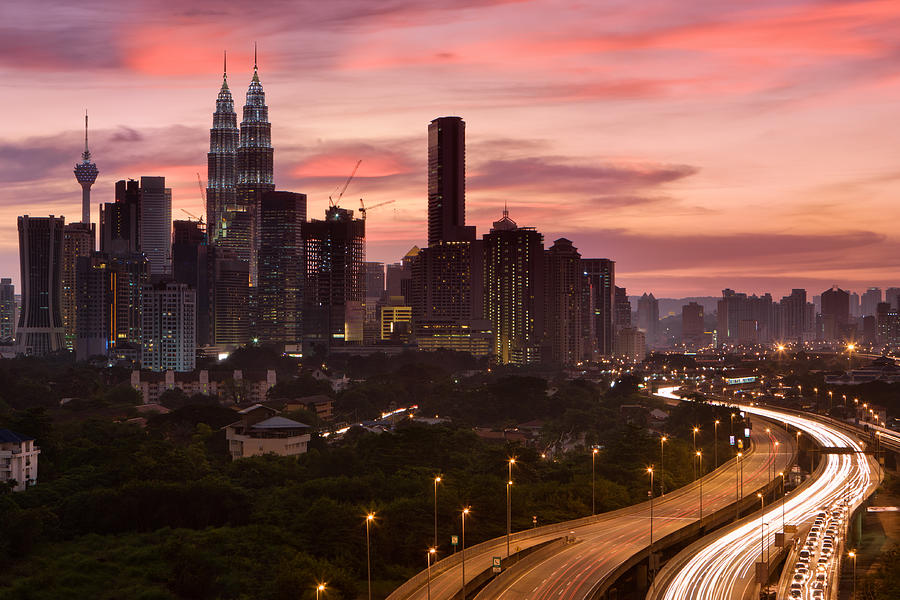 City skyline - Kuala Lumpur at dusk Photograph by Bartosz Hadyniak