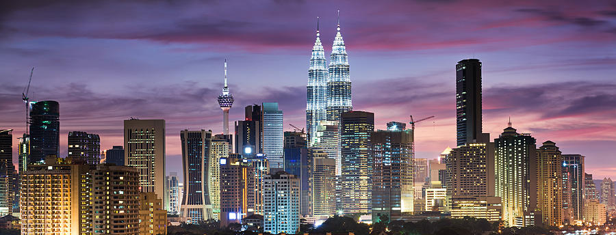 City skyline - Kuala Lumpur at dusk panoramic view Photograph by Hadynyah