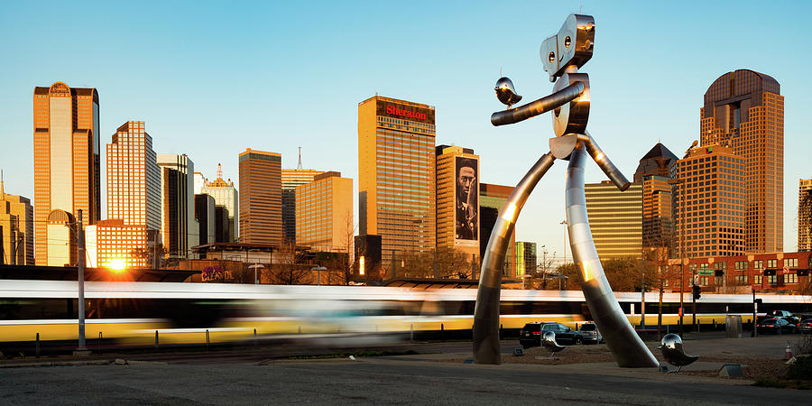 City Skyline of Dallas Texas and Traveling Man Walking Tall Photograph by Gregory Ballos