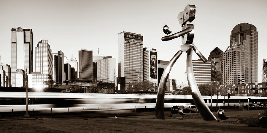 City Skyline of Dallas Texas and Traveling Man Walking Tall - Sepia Photograph by Gregory Ballos