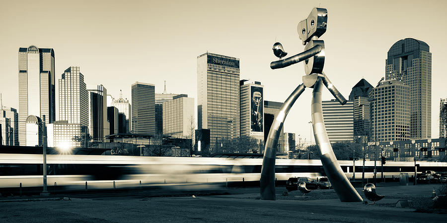 City Skyline of Dallas Texas and Traveling Man Walking Tall - Sepia Monochrome Photograph by Gregory Ballos