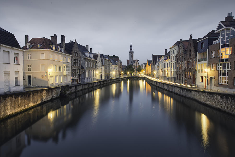 Cityscape at blue hour in Bruges Photograph by Inigo Cia