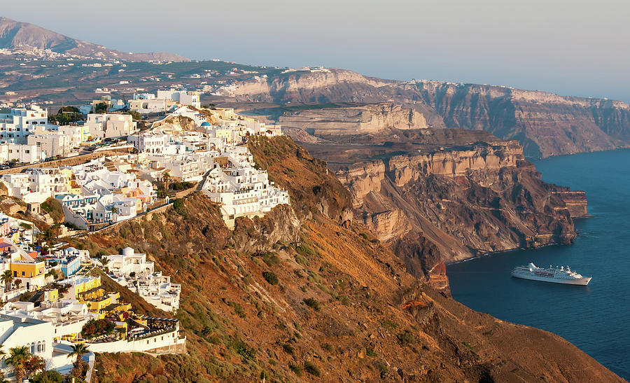 Cityscape of Fira town with white houses and the caldera in Santorini, Greece. Photograph by Michalakis Ppalis