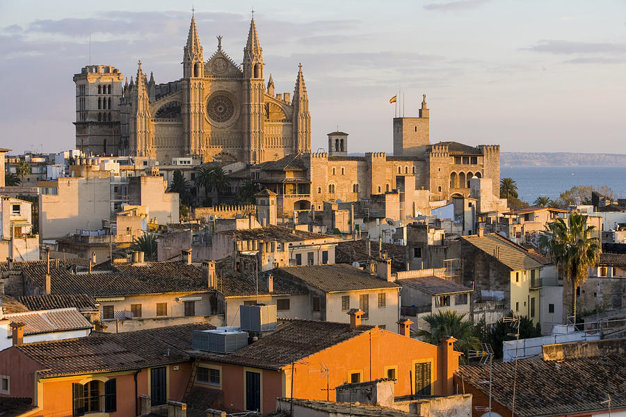 Cityscape with La Seu Cathedral and rooftops, Palma de Mallorca , Majorca, Spain Photograph by Russ Rohde
